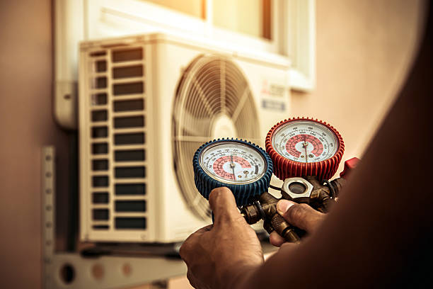 Professional Hvac technician working in Century, FL